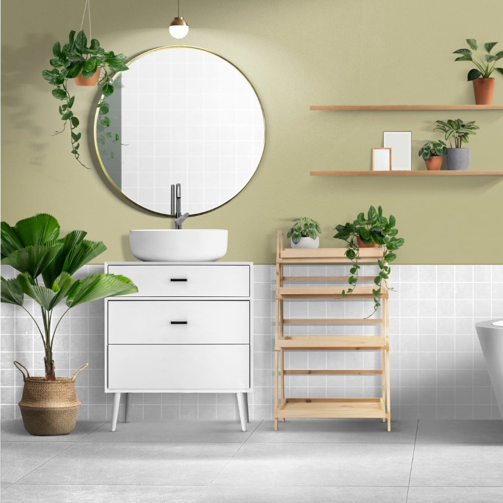 White vanity with a vessel basin, round mirror and open timber shelving